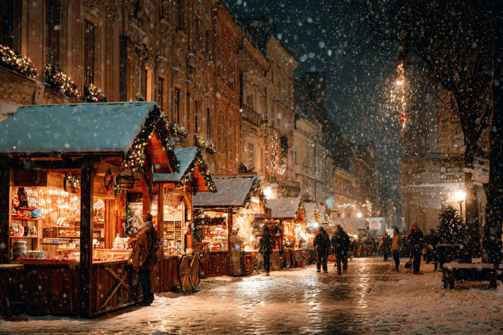 Snowy christmas market in Malmö showing small cute houses