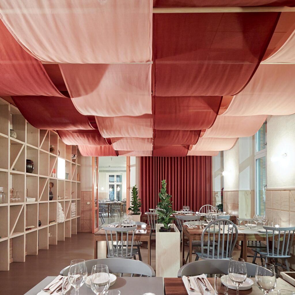 Red and pink interior of Namu in Malmö